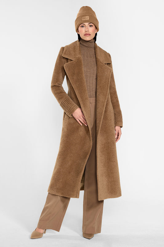 Sentaler Alpaca Beanie crafted in Baby Alpaca and in Dark Camel Brown. Seen from front on female model.