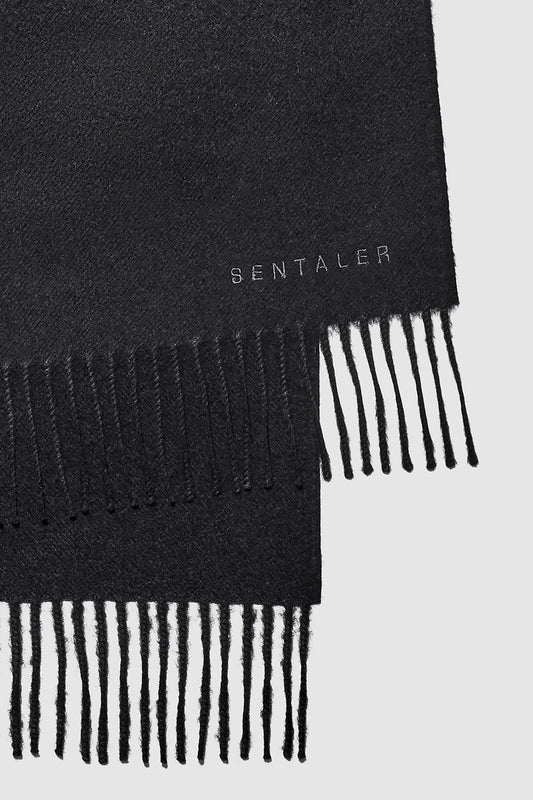 Sentaler Baby Alpaca Classic Scarf featured in Baby Alpaca and available in Black. Seen as off figure close up.