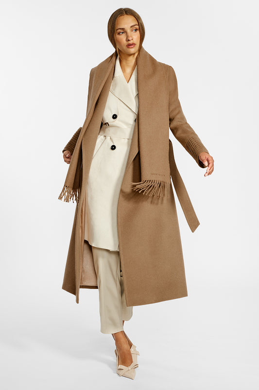 Sentaler Baby Alpaca Classic Scarf and the Long Notched Collar Wrap Coatcrafted in Baby Alpaca and in Dark Camel. Seen from front open on female model.