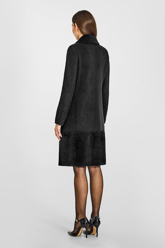 Sentaler A-line Black Coat with Bouclé Alpaca Collar and Trim in Baby Alpaca wool. Seen from back on female model.