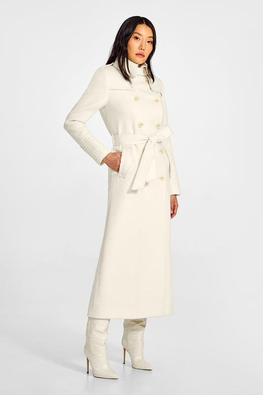 Sentaler Maxi Trench Ivory Coat in Baby Alpaca wool. Seen from side belted on female model.