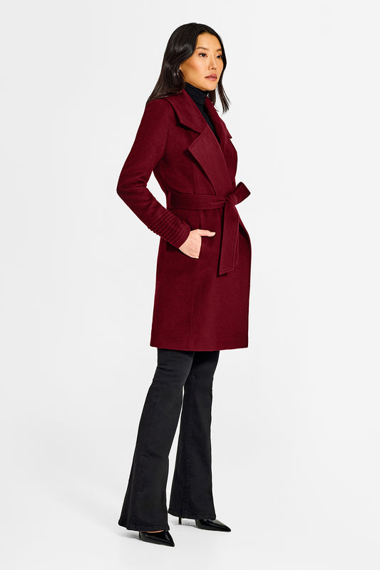 Sentaler Large Notched Collar Wrap Garnet Red Coat in Baby Alpaca wool. Seen from side belted on female model.