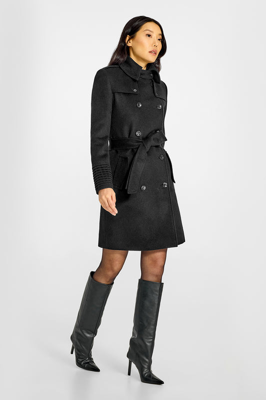 Sentaler Mid Length Trench Black Coat in Baby Alpaca wool. Seen from side belted on female model.