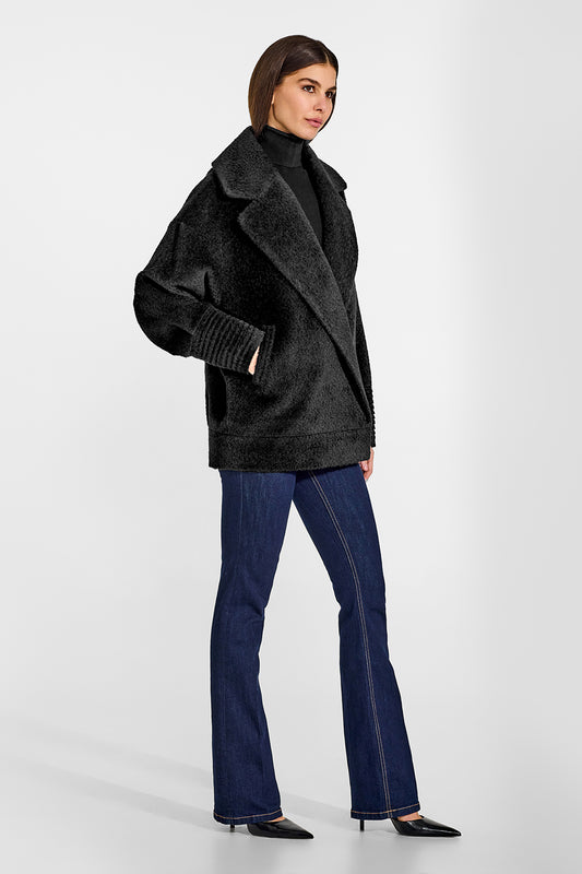 Sentaler Bouclé Alpaca Aviator Black Jacket in Bouclé Alpaca wool. Seen from side on female model.