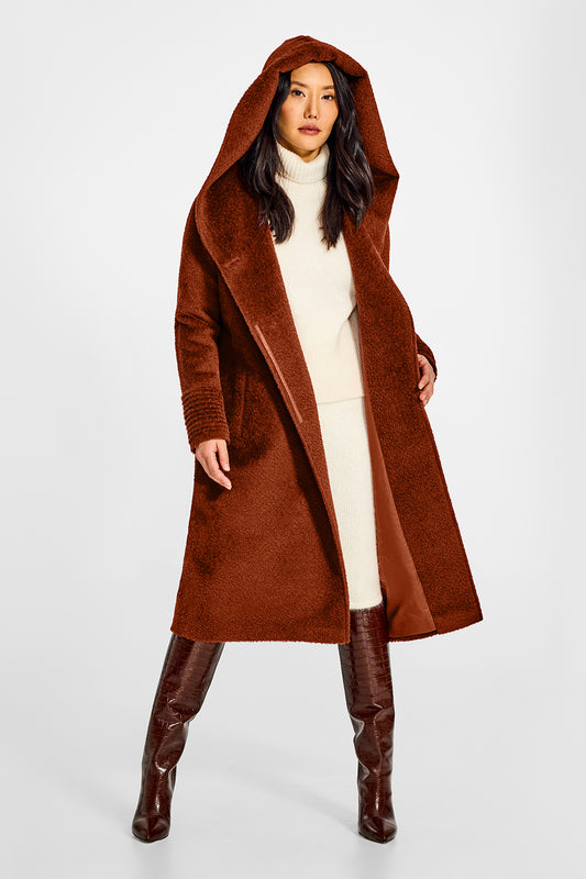 Sentaler Bouclé Alpaca Long Hooded Rust Coat in Bouclé Alpaca wool. Seen from front open with hood on female model.