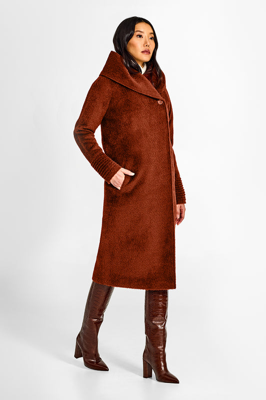 Sentaler Bouclé Alpaca Long Hooded Rust Coat in Bouclé Alpaca wool. Seen from side on female model.