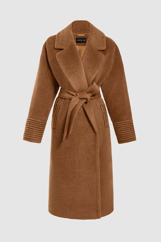 Sentaler Bouclé Alpaca Long Oversized Notched Collar Coat featured in Bouclé Alpaca and available in Caramel Café. Seen as off figure belted.