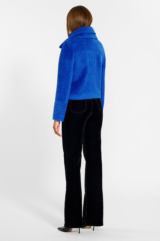 Sentaler Bouclé Alpaca Moto Jacket with Signature Double Collar featured in Bouclé Alpaca and available in Cobalt Blue. Seen from back on female model.