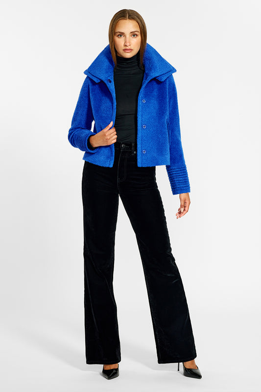 Sentaler Bouclé Alpaca Moto Jacket with Signature Double Collar featured in Bouclé Alpaca and available in Cobalt Blue. Seen from front open on female model.
