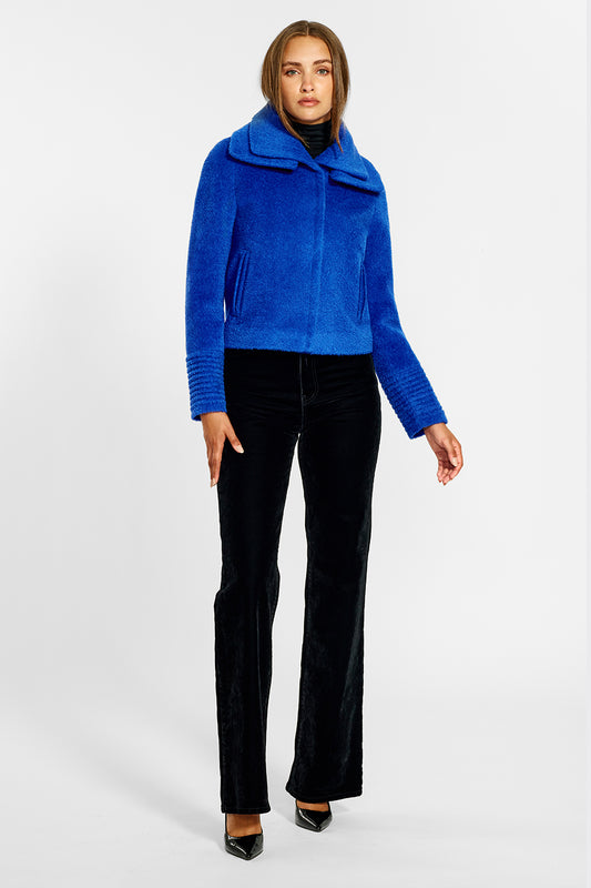 Sentaler Bouclé Alpaca Moto Jacket with Signature Double Collar featured in Bouclé Alpaca and available in Cobalt Blue. Seen from front on female model.