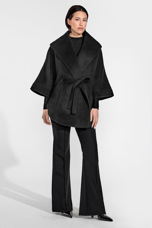 Sentaler Cape with Shawl Collar and Belt featured in Baby Alpaca and available in Black. Seen from front on female model who is wearing the cape belted.
