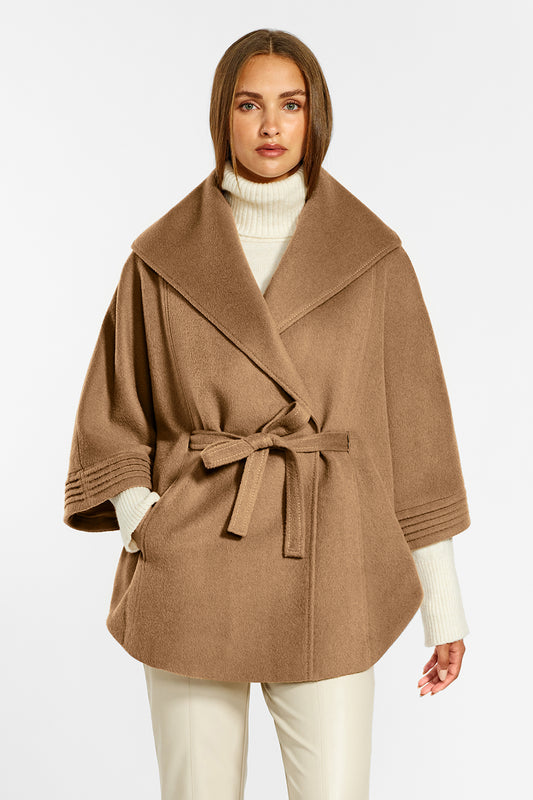 Sentaler Cape with Shawl Collar and Belt crafted in Baby Alpaca wool and in Dark Camel. Seen from front above the knees on female model belted.