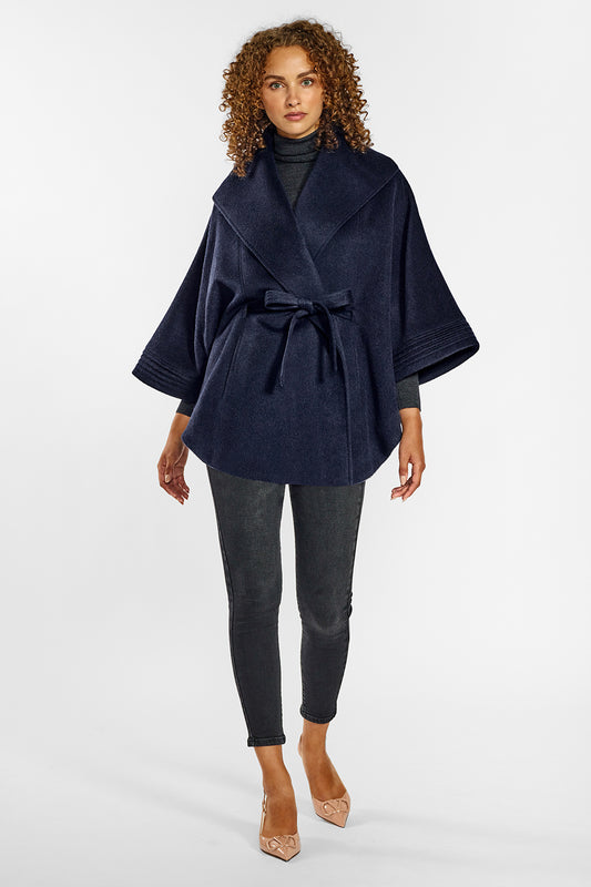 Sentaler Cape with Shawl Collar and Belt crafted in Baby Alpaca wool and in Deep Navy Blue. Seen from front on female model belted.