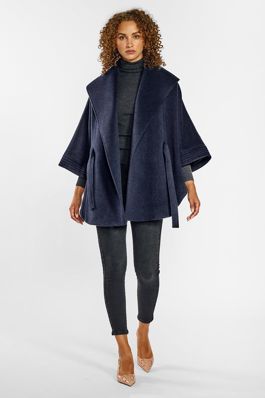 Sentaler Cape with Shawl Collar and Belt crafted in Baby Alpaca wool and in Deep Navy Blue. Seen from front open on female model.