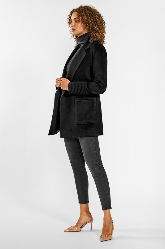 Sentaler Cropped Notched Collar Wrap Coat with Square Pockets crafted in Baby Alpaca and in Black. Seen from side open on female model.