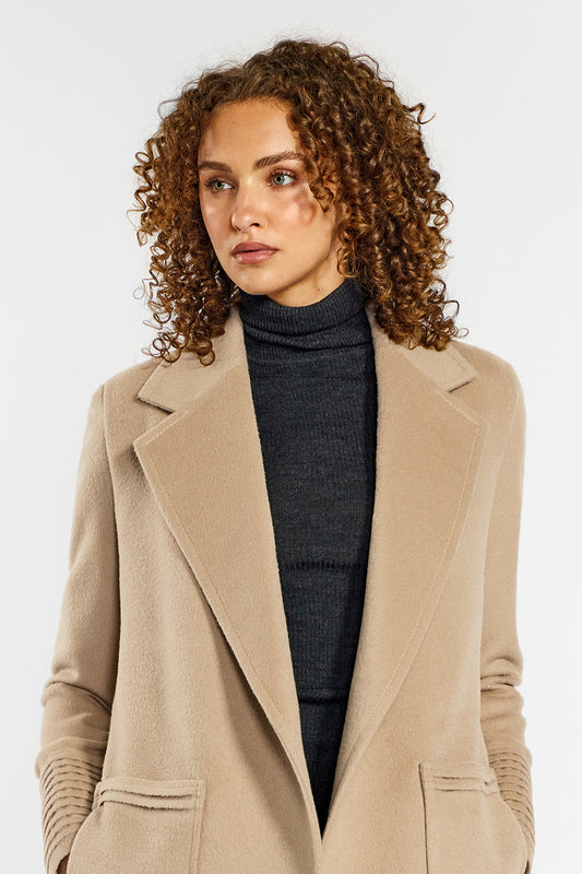 Sentaler Cropped Notched Collar Wrap Coat with Square Pockets crafted in Baby Alpaca and in Camel. Seen from front open close up on female model.