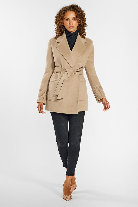 Sentaler Cropped Notched Collar Wrap Coat with Square Pockets crafted in Baby Alpaca and in Camel. Seen from front on female model wearing the coat belted.