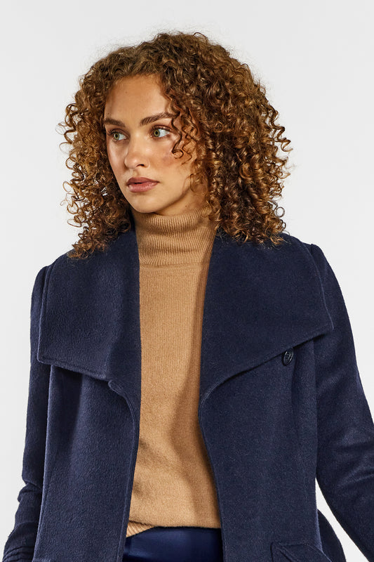 Sentaler Long Wide Collar Wrap Coat crafted in Baby Alpaca wool and in Deep Navy. Seen from front open close up on female model.
