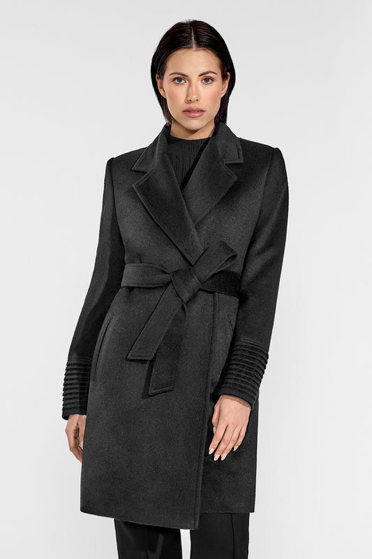 Sentaler Mid Length Notched Collar Wrap Coat featured in Baby Alpaca and available in Black. Seen from front above the knees on female model who is wearing the coat belted.