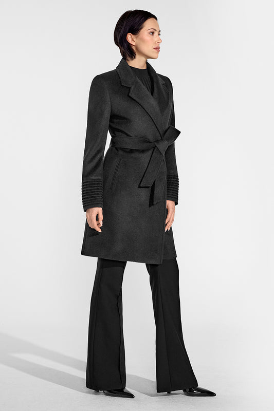 Sentaler Mid Length Notched Collar Wrap Coat featured in Baby Alpaca and available in Black. Seen from side on female model who is wearing the coat belted.