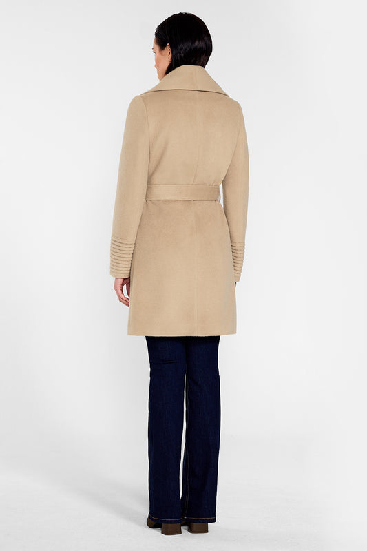 Sentaler Mid Length Shawl Collar Wrap Coat featured in Baby Alpaca and available in Camel. Seen from back on female model who is wearing the coat belted.