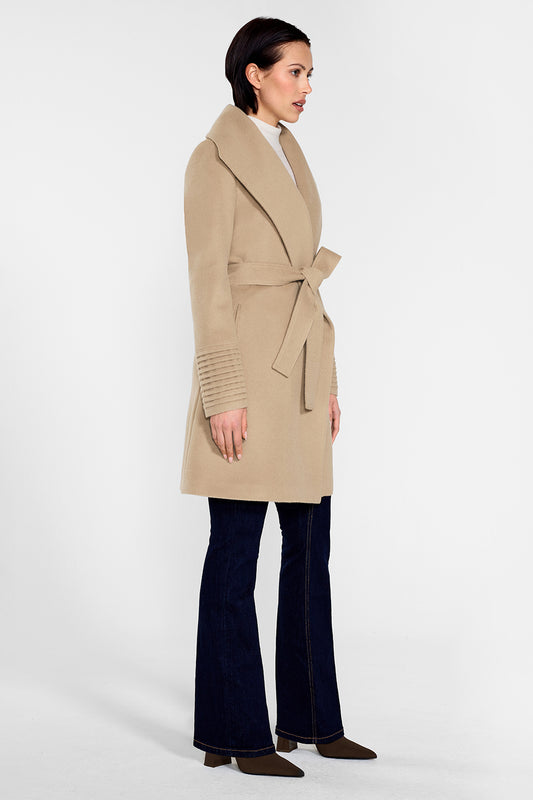 Sentaler Mid Length Shawl Collar Wrap Coat featured in Baby Alpaca and available in Camel. Seen from side on female model who is wearing the coat belted.