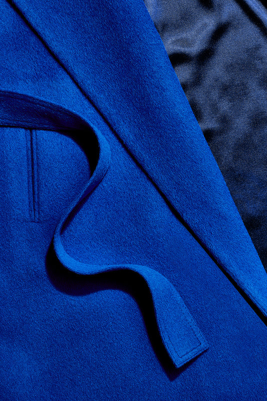 Sentaler Mid Length Shawl Collar Wrap Coat crafted in Baby Alpaca wool and in Cobalt Blue. Seen as fabric swatch up close.