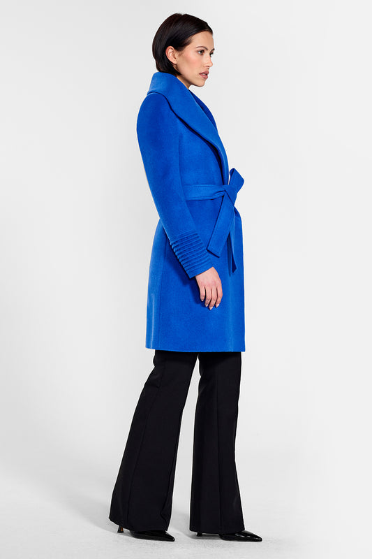 Sentaler Mid Length Shawl Collar Wrap Coat crafted in Baby Alpaca wool and in Cobalt Blue. Seen from side on female model.