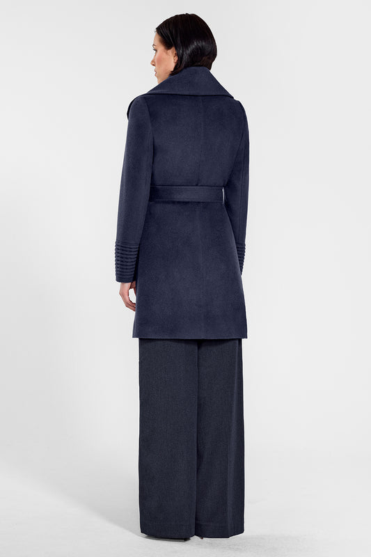 Sentaler Mid Length Shawl Collar Wrap Coat featured in Baby Alpaca and available in Deep Navy. Seen from back on female model who is wearing the coat belted.