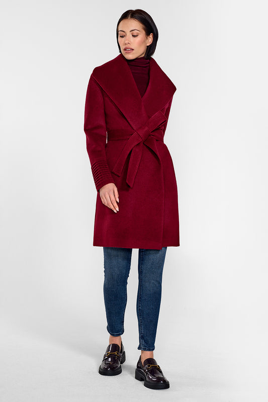 Sentaler Mid Length Shawl Collar Wrap Coat featured in Baby Alpaca and available in Garnet Red. Seen from front on female model who is wearing the coat belted.