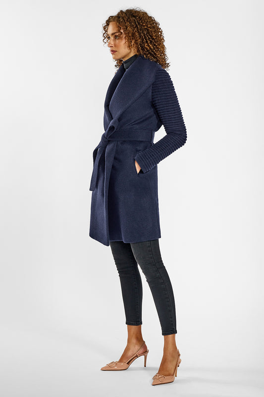 Sentaler Mid Length Shawl Collar Wrap Coat with Ribbed Sleeves crafted in Baby Alpaca wool and in Deep Navy Blue. Seen from side on female model.