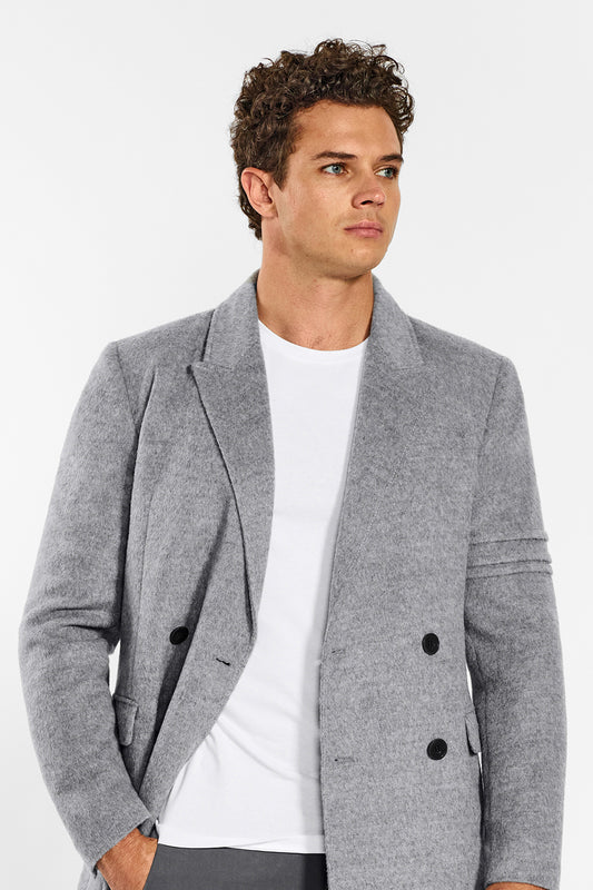 Sentaler Baby Alpaca Double Breasted Shale Grey Overcoat in Technical Baby Alpaca wool. Seen from front open close up on male model.