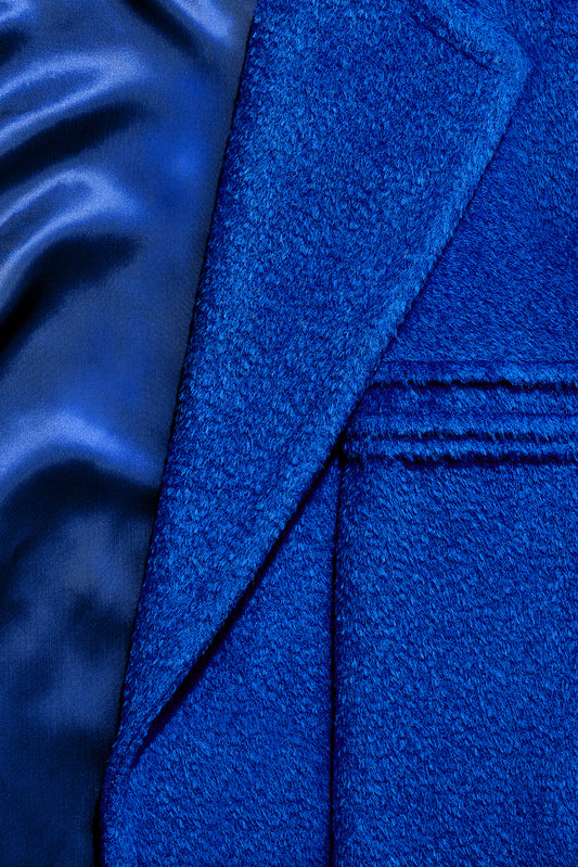 Sentaler Technical Bouclé Alpaca Robe Coat crafted in Technical Bouclé Alpaca and available in Cobalt Blue. Seen as fabric swatch close up.