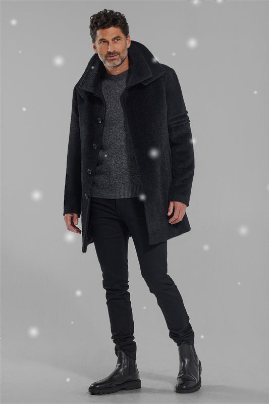 Sentaler Technical Bouclé Alpaca Double Collar Topcoat featured in Technical Bouclé Alpaca and available in Black. Seen from front with snow effect.