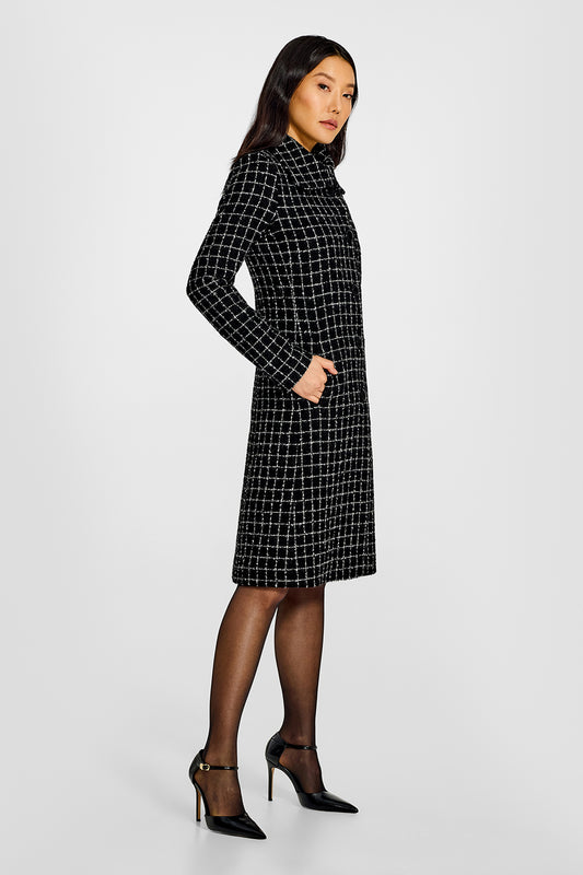 Sentaler Tweed Alpaca A-line Black Check Coat in Tweed Suri Alpaca wool. Seen from side on female model.