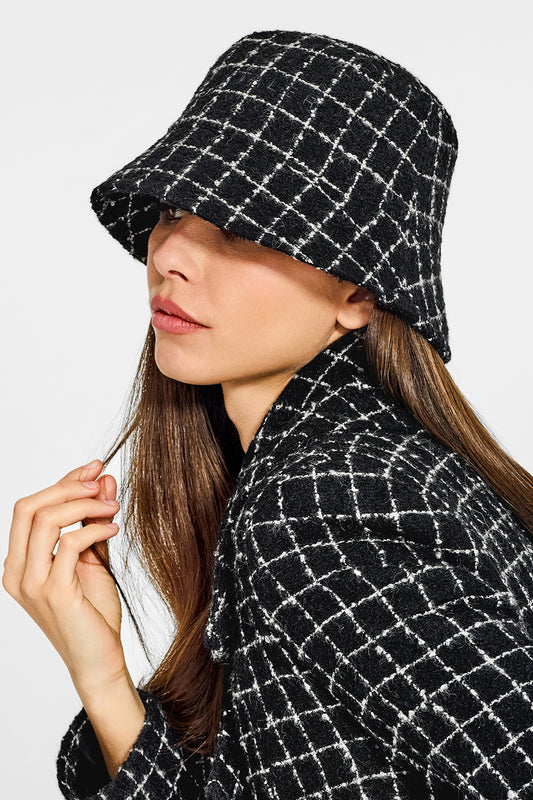 Sentaler Tweed Black Check Bucket Hat in Tweed Suri Alpaca wool. Seen from side close up on female model.