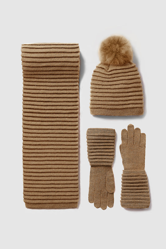 Sentaler Adult Ribbed Scarf featured in Baby Alpaca and available in Dark Camel. Seen as off figures.