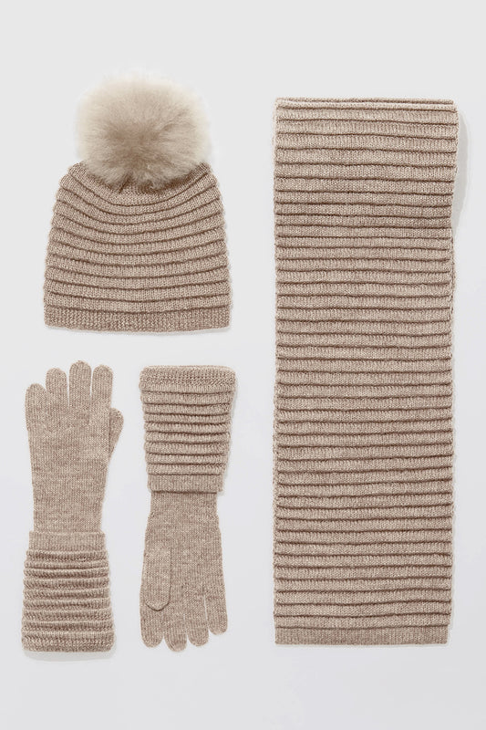 Sentaler Adult Ribbed Scarf featured in Baby Alpaca and available in Light Taupe. Seen with hat and gloves off model.