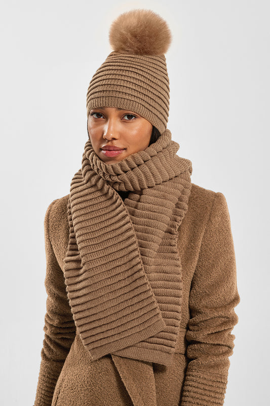 Sentaler Adult Ribbed Hat With Oversized Fur Pompon featured in Baby Alpaca and available in Dark Camel. Seen from front.