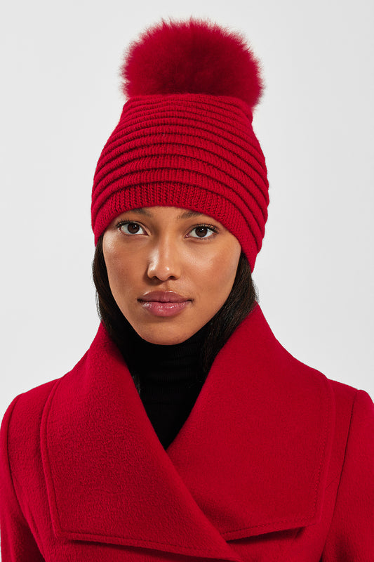 Sentaler Adult Ribbed Hat With Oversized Fur Pompon featured in Baby Alpaca and available in Red. Seen from front close-up.