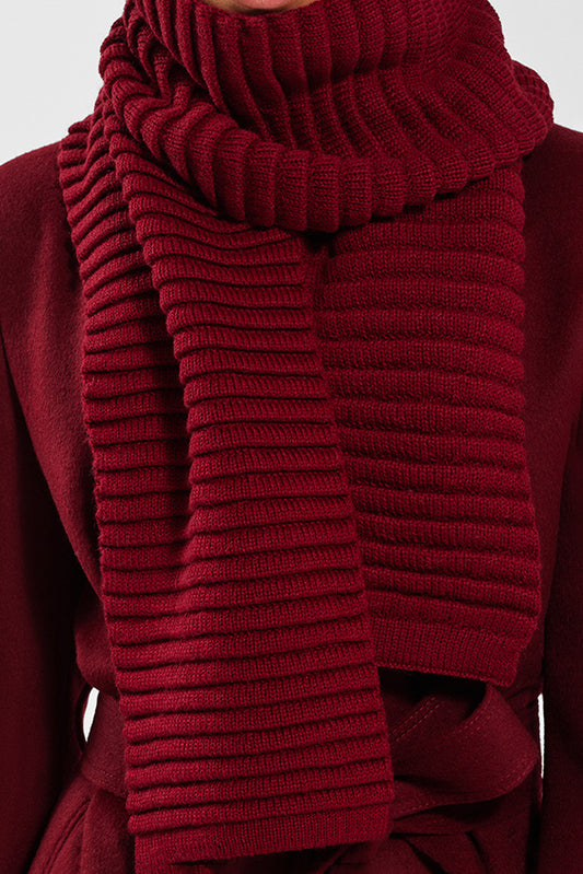 Sentaler Adult Ribbed Scarf featured in Baby Alpaca and available in Garnet Red. Seen on model up close of just the scarf.