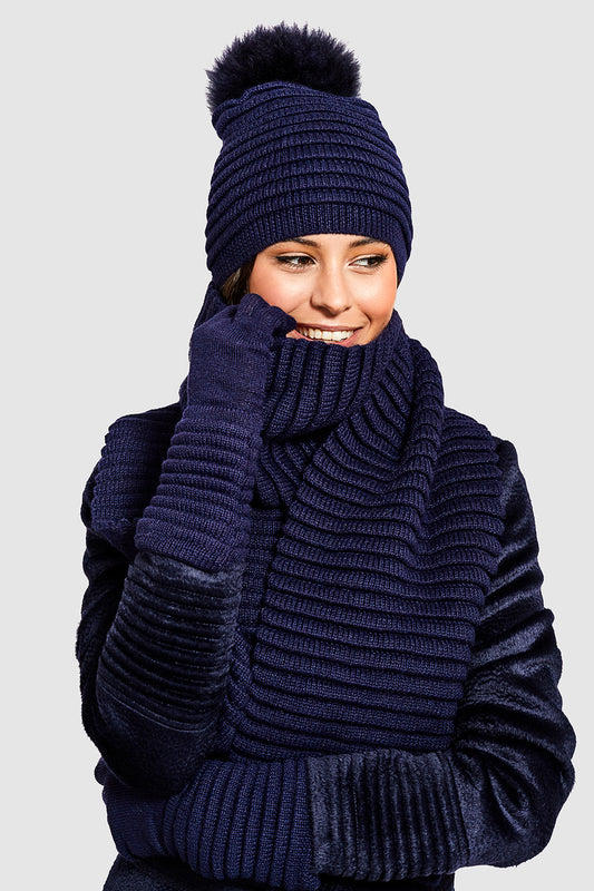 Sentaler Adult Ribbed Scarf featured in Baby Alpaca and available in Navy. Seen with hat and gloves 1.
