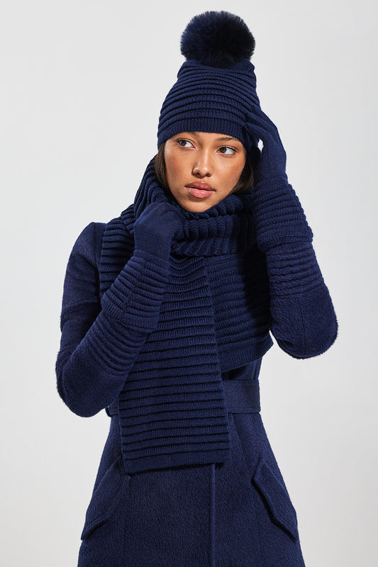 Sentaler Adult Ribbed Scarf featured in Baby Alpaca and available in Navy. Seen with hat and gloves 2.