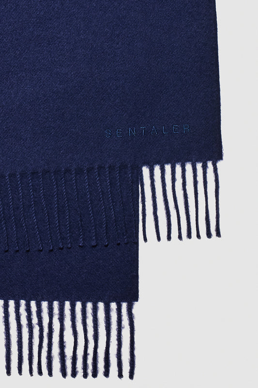 Sentaler Baby Alpaca Classic Scarf featured in Baby Alpaca and available in Navy. Seen as off figure close up.
