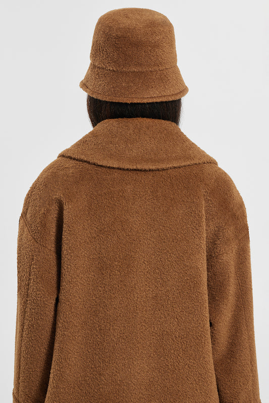 Sentaler Bouclé Alpaca Bucket Hat featured in Bouclé Alpaca and available in Caramel Café. Seen from back close up.