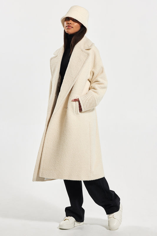 Sentaler Bouclé Alpaca Bucket Hat featured in Bouclé Alpaca and available in Ivory. Seen from side.