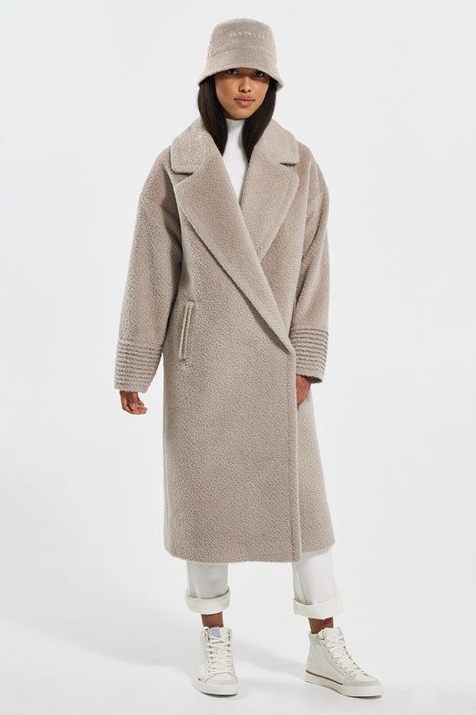 Sentaler Bouclé Alpaca Bucket Hat featured in Bouclé Alpaca and available in Sand. Seen from front.