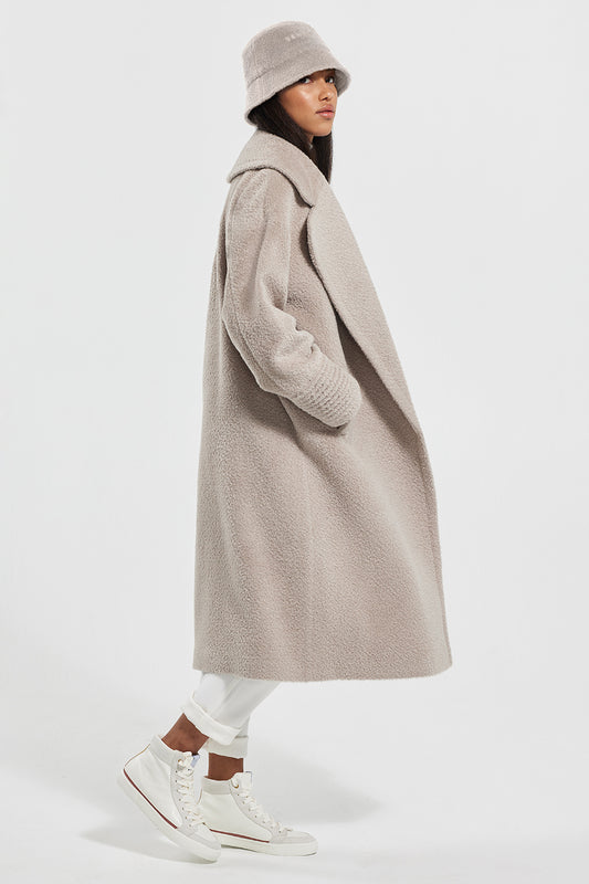 Sentaler Bouclé Alpaca Bucket Hat featured in Bouclé Alpaca and available in Sand. Seen as off figure.