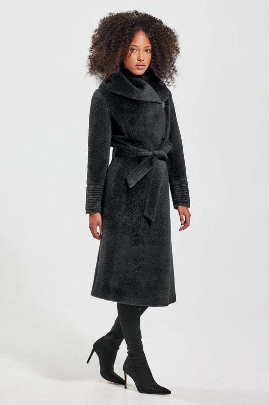Sentaler Bouclé Alpaca Long Hooded Wrap Coat featured in Bouclé Alpaca and available in Black. Seen from side on model.