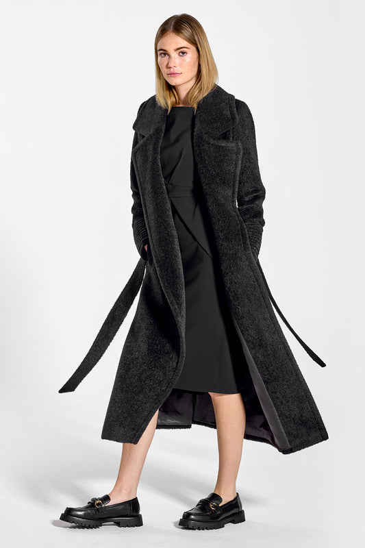 Sentaler Bouclé Alpaca Long Notched Collar Wrap Coat featured in Bouclé Alpaca and available in Black. Seen from side open on model.